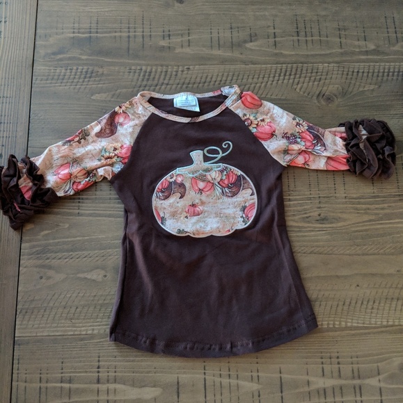Toddler pumpkin shirt with ruffle sleeves. - Picture 1 of 3